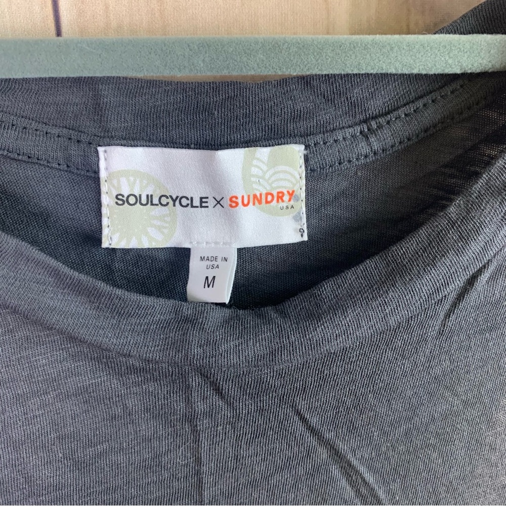 Soulcycle X Sundry Tank Size Medium
Back seam has been cut as seen in pictures. - Picture 3 of 6